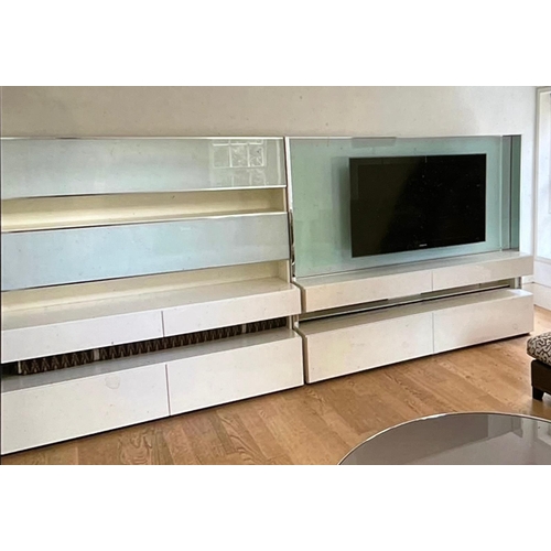 15 - A wall media unit with gloss and chrome frame and frosted glass along with a flat screen TV (each un... 