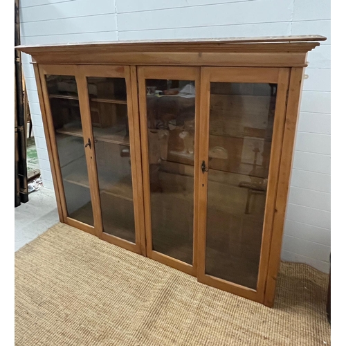 156 - A dresser display top or floor standing display, the glazed doors open to shelves (H150cm W195cm D37... 