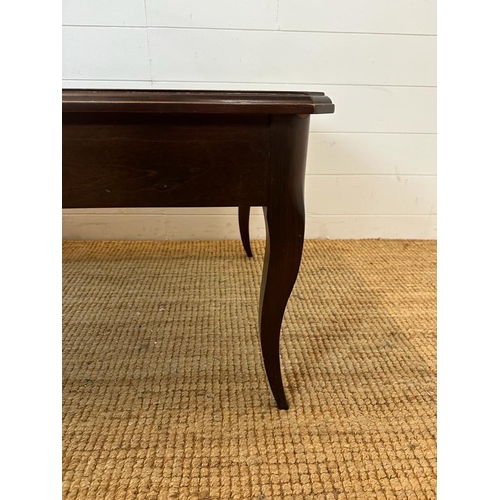 159 - A mahogany single drawer coffee table (H46cm W114cm D64cm)