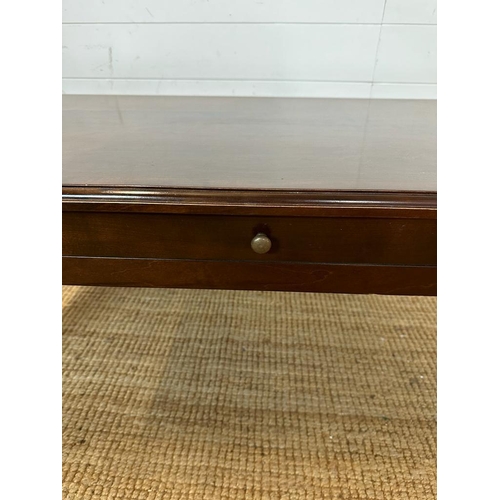 159 - A mahogany single drawer coffee table (H46cm W114cm D64cm)