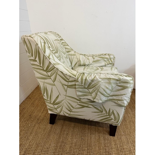 160 - A pair of contemporary arm chairs, upholstered in bamboo leaf pattern fabric