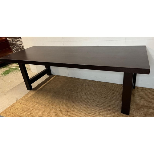 172 - A dark wood dining table, contemporary design and poliform style (H76cm W220cm D90cm)