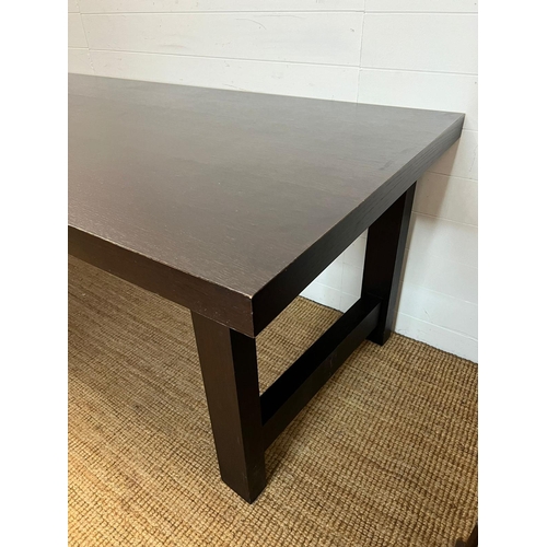 172 - A dark wood dining table, contemporary design and poliform style (H76cm W220cm D90cm)