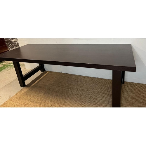 172 - A dark wood dining table, contemporary design and poliform style (H76cm W220cm D90cm)