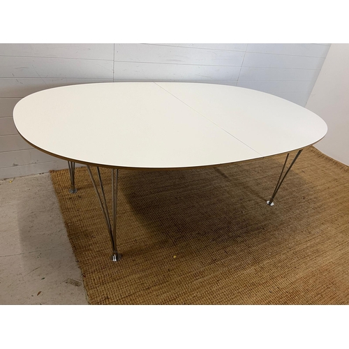 177 - A Bruno Mathsson Scandinavian dining table with chrome legs (H73cm W200cm D120cm each leaf 50cm)