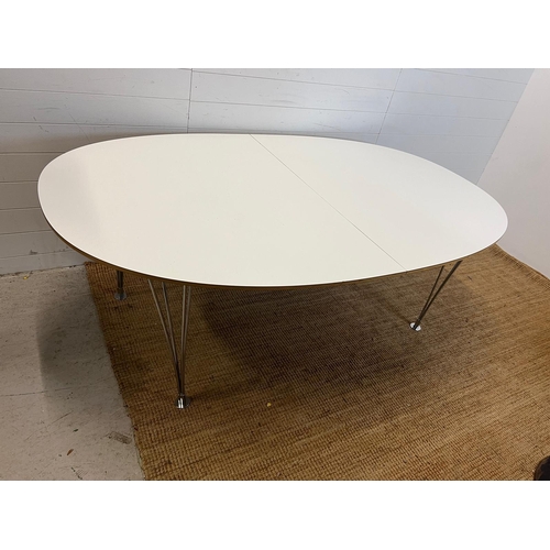 177 - A Bruno Mathsson Scandinavian dining table with chrome legs (H73cm W200cm D120cm each leaf 50cm)