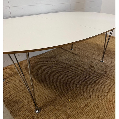 177 - A Bruno Mathsson Scandinavian dining table with chrome legs (H73cm W200cm D120cm each leaf 50cm)