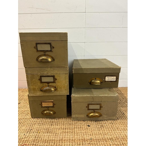 179 - A selection of six green vintage storage boxes