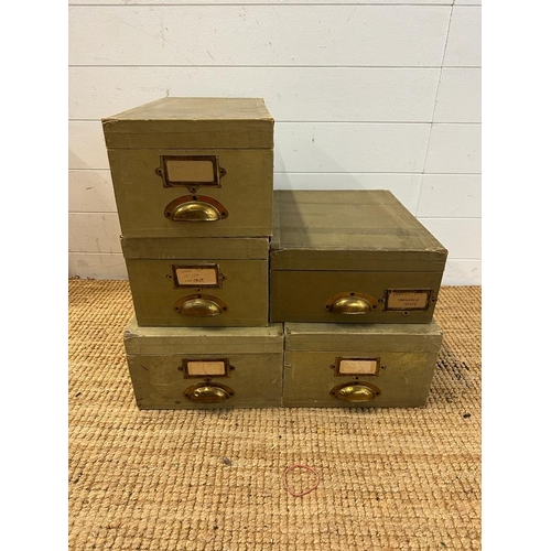 180 - A selection of five green vintage storage boxes