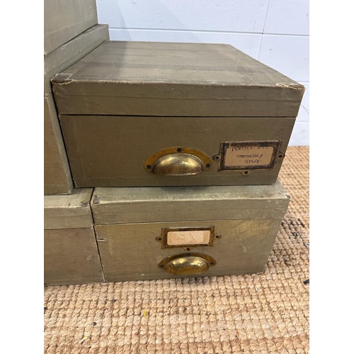 180 - A selection of five green vintage storage boxes