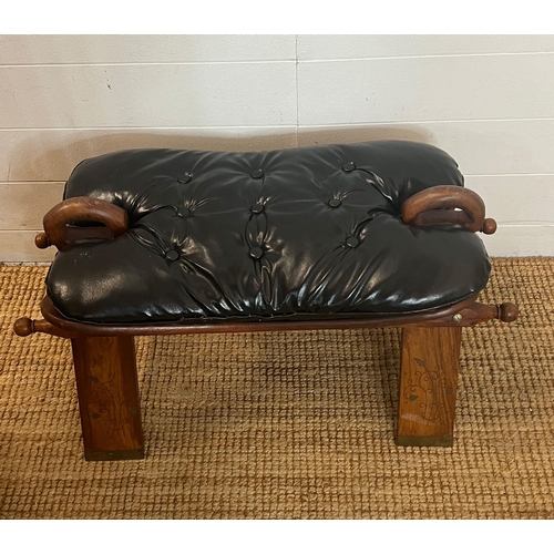 185 - A camel saddle stool (H40cm W62cm D39cm)