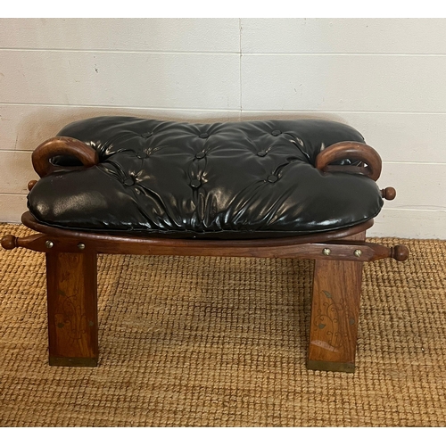 185 - A camel saddle stool (H40cm W62cm D39cm)