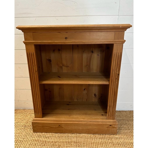 188 - A pine two shelf bookcase with fluted sides (H78cm W66cm D30cm)