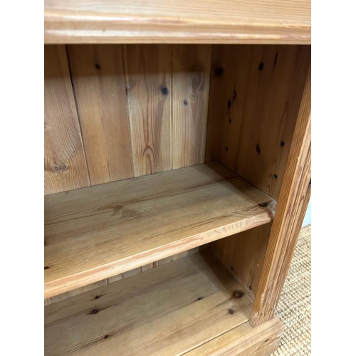 188 - A pine two shelf bookcase with fluted sides (H78cm W66cm D30cm)