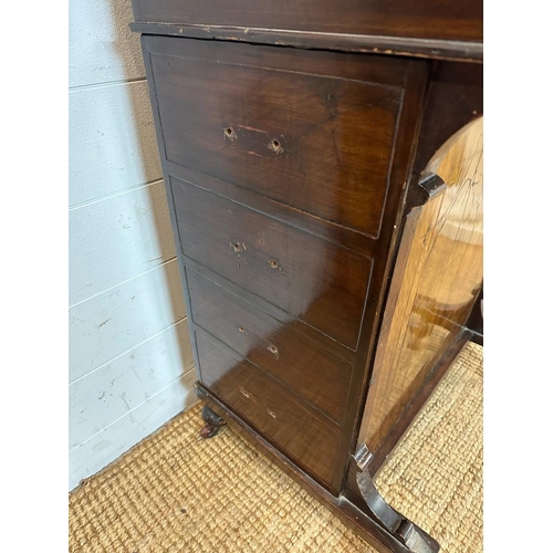 191 - A Victorian inlaid Davenport on castors, flanked by four drawers either side, hinged desk lid and de... 