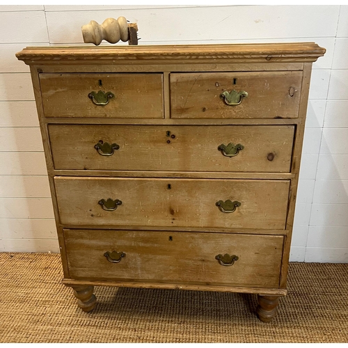 194 - Two over three pine chest of drawers with brass handles (H114cm W98cm D50cm)