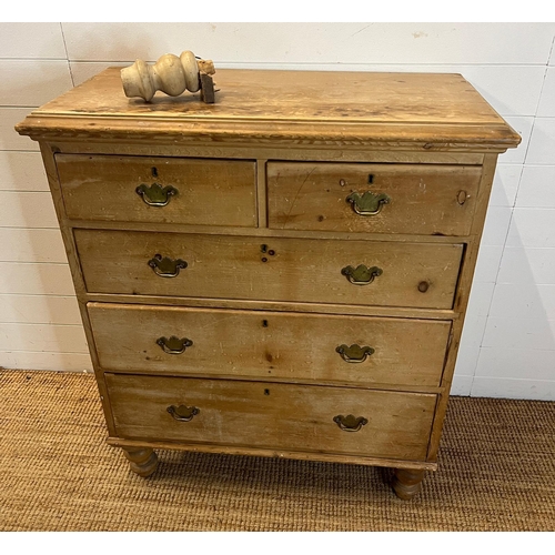 194 - Two over three pine chest of drawers with brass handles (H114cm W98cm D50cm)