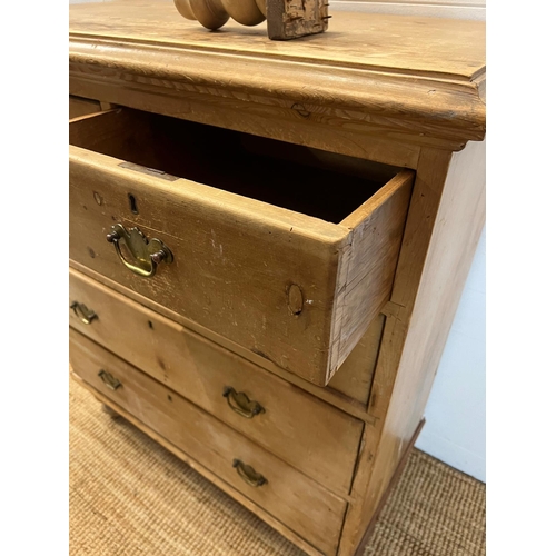 194 - Two over three pine chest of drawers with brass handles (H114cm W98cm D50cm)