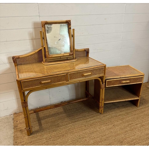 196 - A bamboo and rattan two drawer dressing table with mirror and a matching bedside table (H94cm W97cm ... 