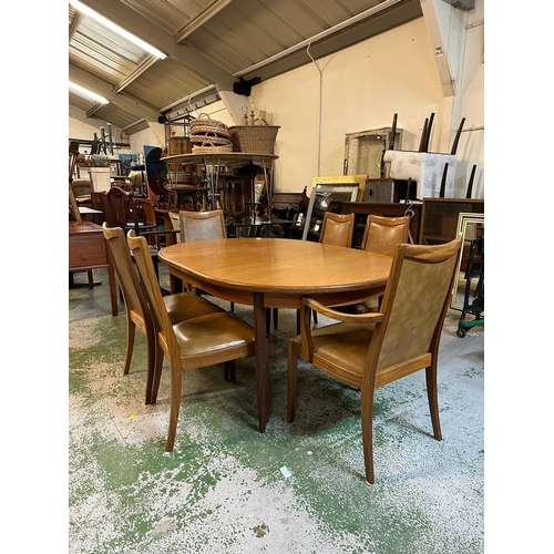 212 - A G-Plan teak extendable dining table and six chairs