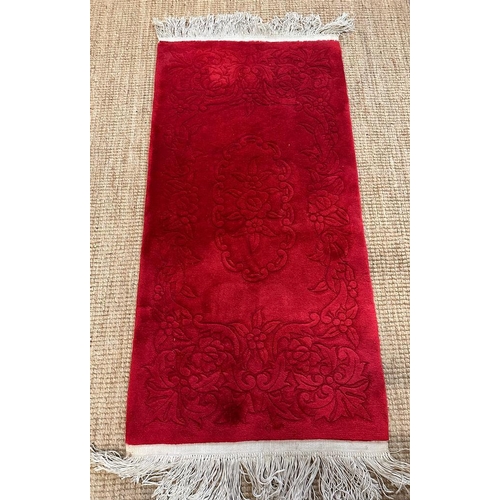 229 - A red ground rug or prayer mat with floral inlay 170x71