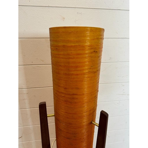 231 - A Mid Century floor standing teak rocket lamp with orange spur fibre glass shade )H113cm)