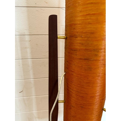 231 - A Mid Century floor standing teak rocket lamp with orange spur fibre glass shade )H113cm)