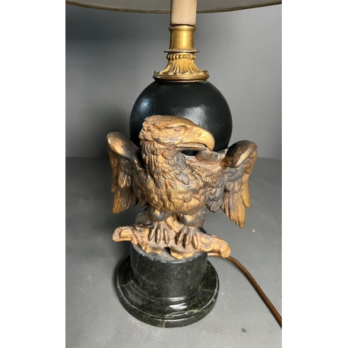 232 - An Eagle table lamp with a cast eagle sculpture to side on a marble base