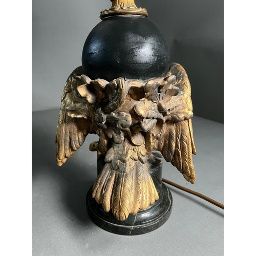 232 - An Eagle table lamp with a cast eagle sculpture to side on a marble base