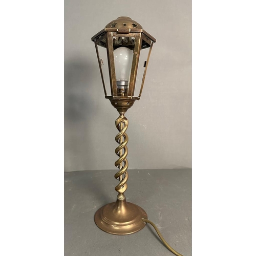 234 - A brass lantern style table lamp on barley twist column base