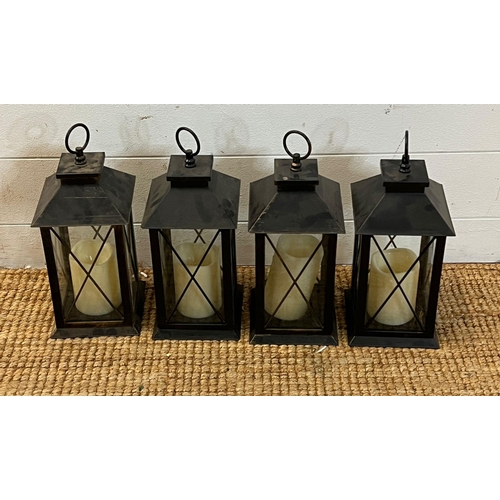 238 - Four metal lanterns