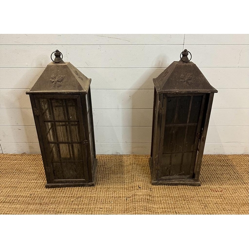 243 - Two large black wooden framed hanging lanterns, lead glazed on all sides with hammered tin roofs (H7... 