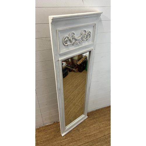 247 - A white painted mirror with floral detail to top (57cm x 170cm)