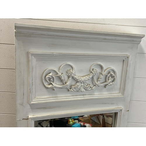 247 - A white painted mirror with floral detail to top (57cm x 170cm)