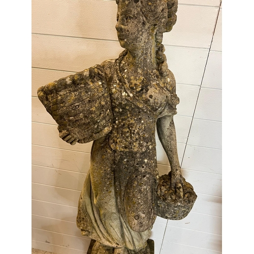 257 - A weathered cast stone statue of a maiden holding two basket (H108cm Base 43cm) 2 pieces