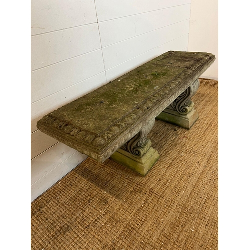 262 - A garden bench/patio seat with scrolling base supports (H43cm W115cm D36cm)