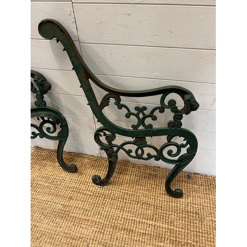 278 - Cast metal bench ends with scrolling pattern and sweeping arms terminating with lion ends