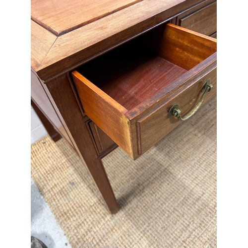 28 - Hardwood desk with one long drawer to centre and two short each side (H76cm W124cm D60cm)