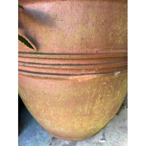 285 - A large terracotta garden planter with ribbed middle (H67cm Dia70cm)