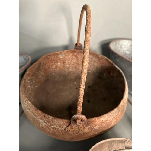 288 - A selection of vintage metal and copper items to include planters, watering can and a cauldron