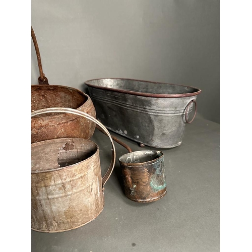 288 - A selection of vintage metal and copper items to include planters, watering can and a cauldron