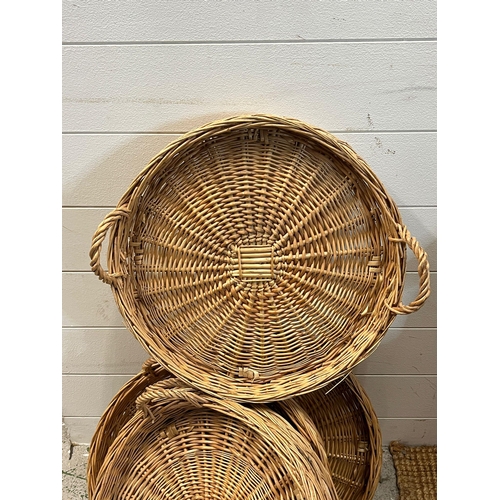 292 - Five circular wicker tray baskets