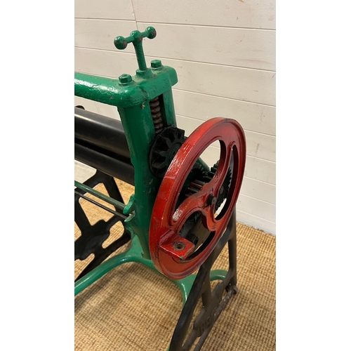 297 - An early iron mangle press (H114cm W75cm)