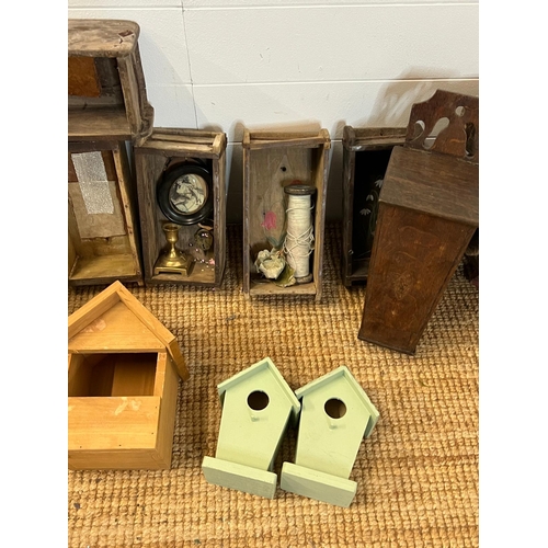 303 - A selection of wooden caddys, brick moulds and bric brac