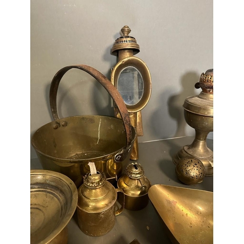 311 - A selection of brass items to include lamps, a cauldron and a rolling shadow ball