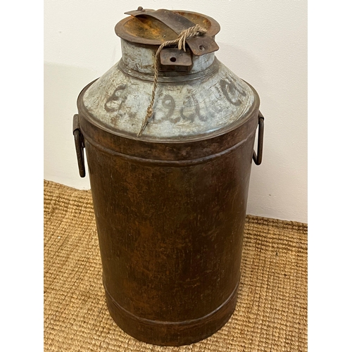 317 - A metal milk churn (H65cm)