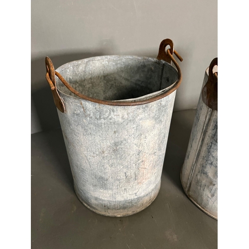 323 - A selection of galvanised pots and planters