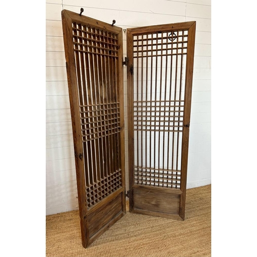 33 - A Korean pine slatted screen 110cm x 178cm