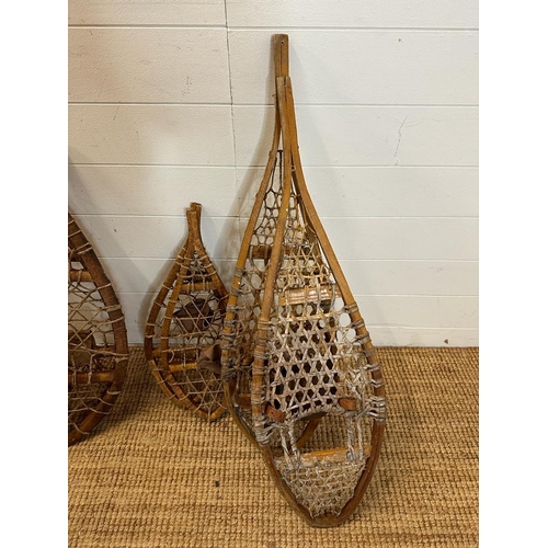 344 - Five pairs of vintage wooden webbed snow shoes