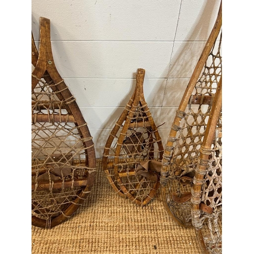 344 - Five pairs of vintage wooden webbed snow shoes